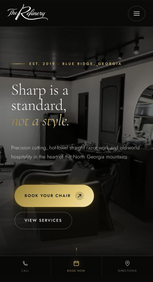 The Refinery Barber Shop homepage on an iPhone